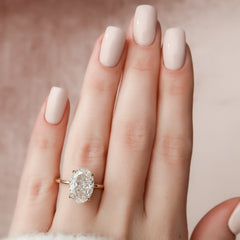 Timeless Oval 2.09 Carat VVS1 Lab-Grown Hidden Halo Engagement Ring in 18K Yellow Gold Finger View