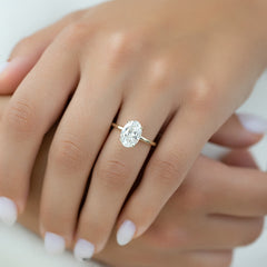 Timeless Oval 2.09 Carat VVS1 Lab-Grown Hidden Halo Engagement Ring in 18K Yellow Gold Hand View